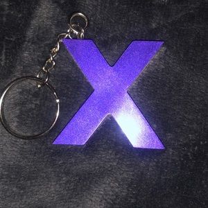 X Purple resin keychain